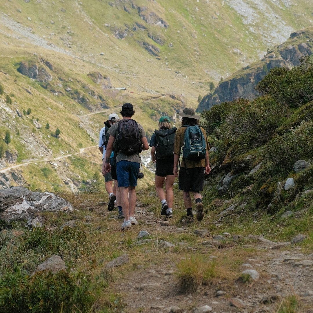 group of seniors hiking in mountains