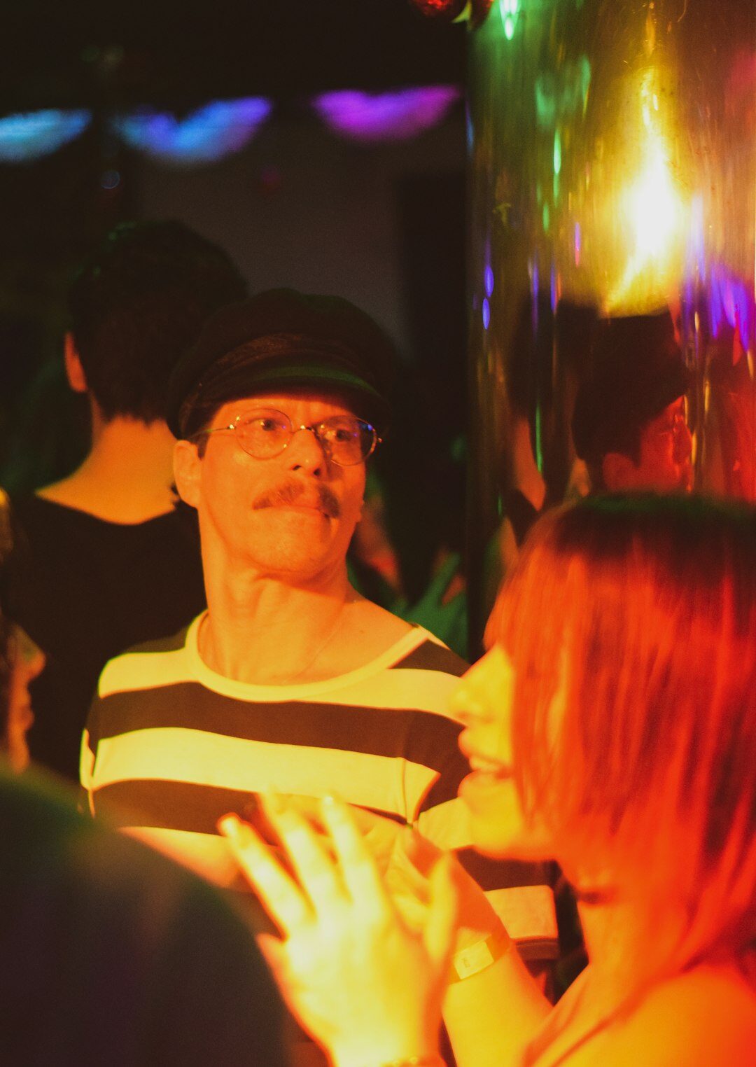 Senior couples dancing together at a social club event