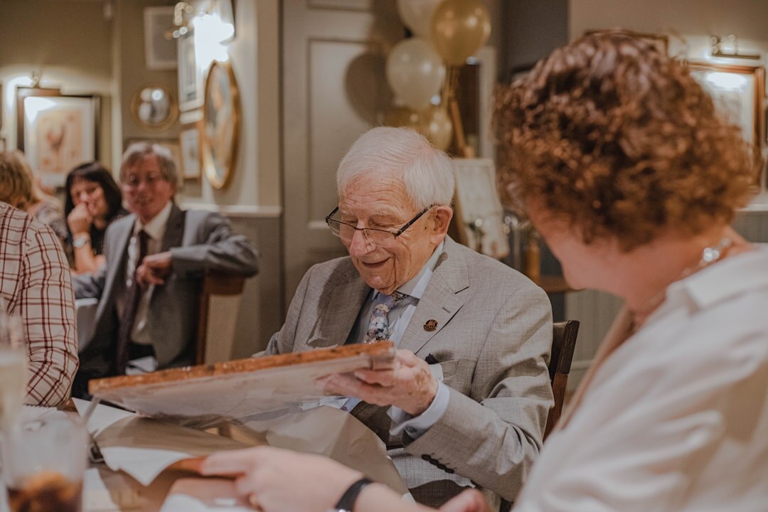 Advisor explaining club services to a senior client